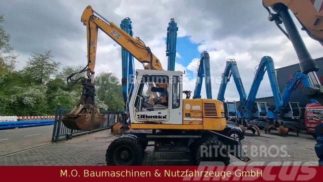 Liebherr A 312 / VSA / Schalengreifer / Wheeled excavators