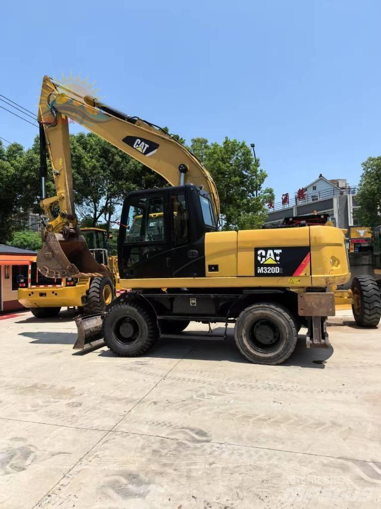 CAT M 315 D2 Excavadoras de ruedas