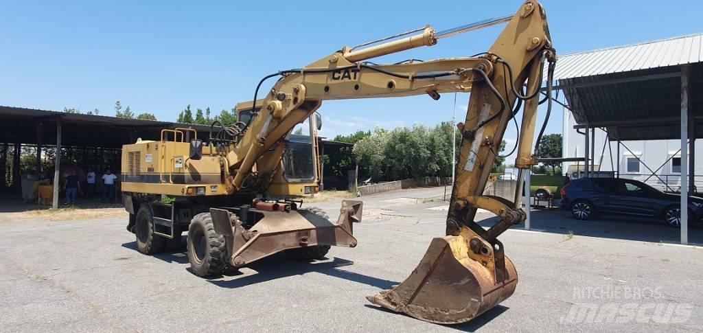 CAT 214 B Excavadoras de ruedas