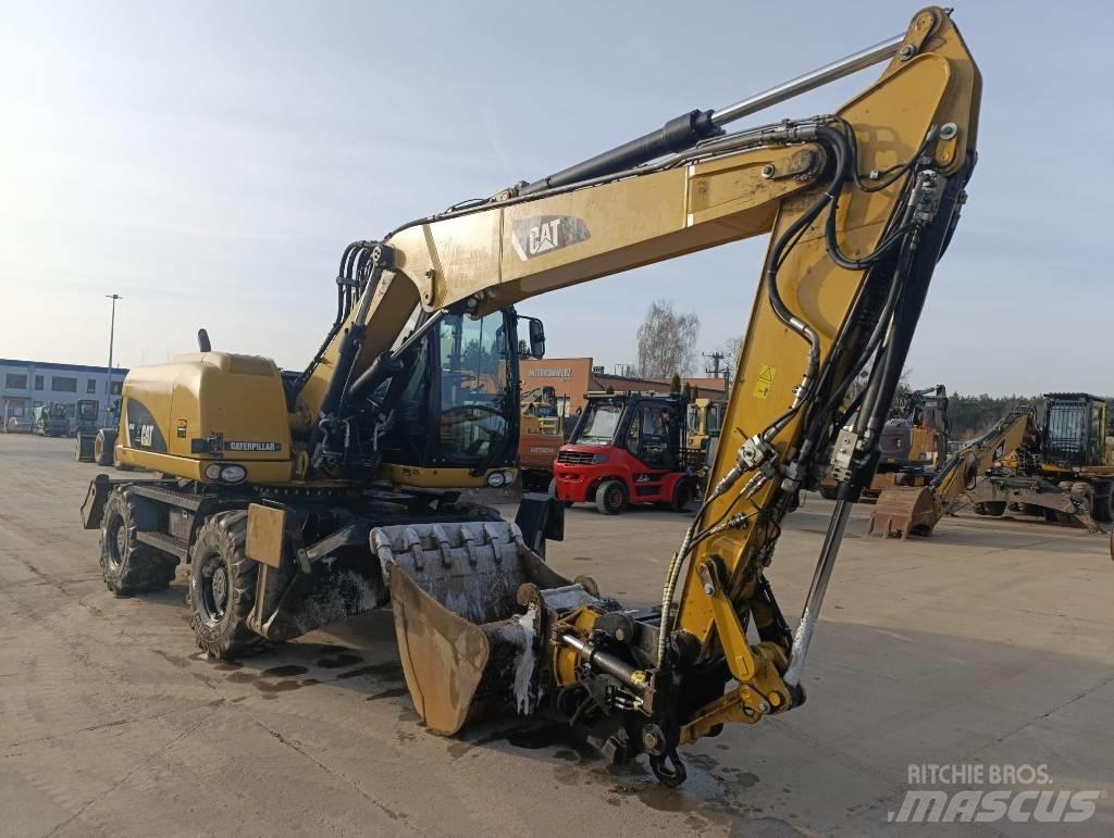 CAT M 313 D Excavadoras de ruedas