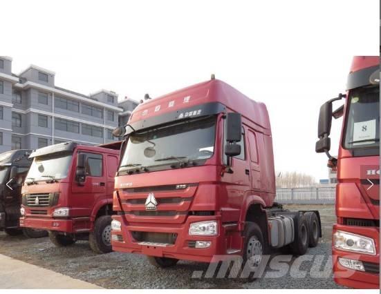 Howo 380 Plataforma plana/laterales abatibles