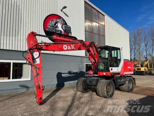 O&K MH 5 Compact Plataformas y cucharones