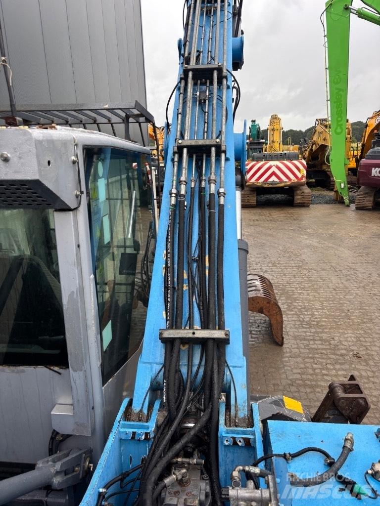 Fuchs MHL 320 D Excavadoras de manutención