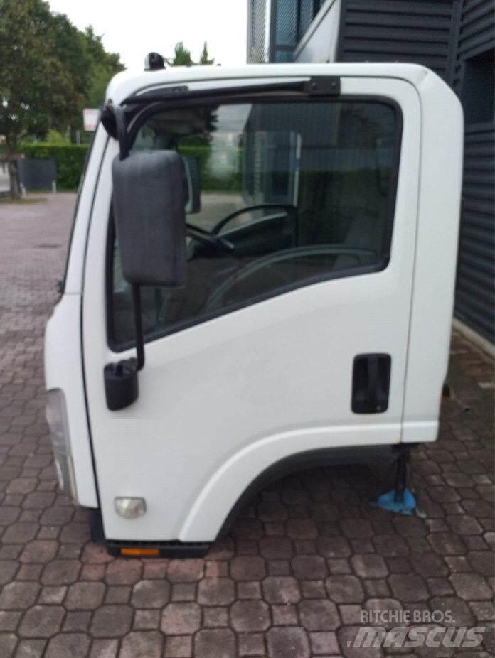 Isuzu M - L Cabinas e interior