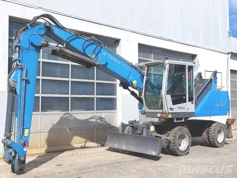 Fuchs MHL 320 D Excavadoras de manutención