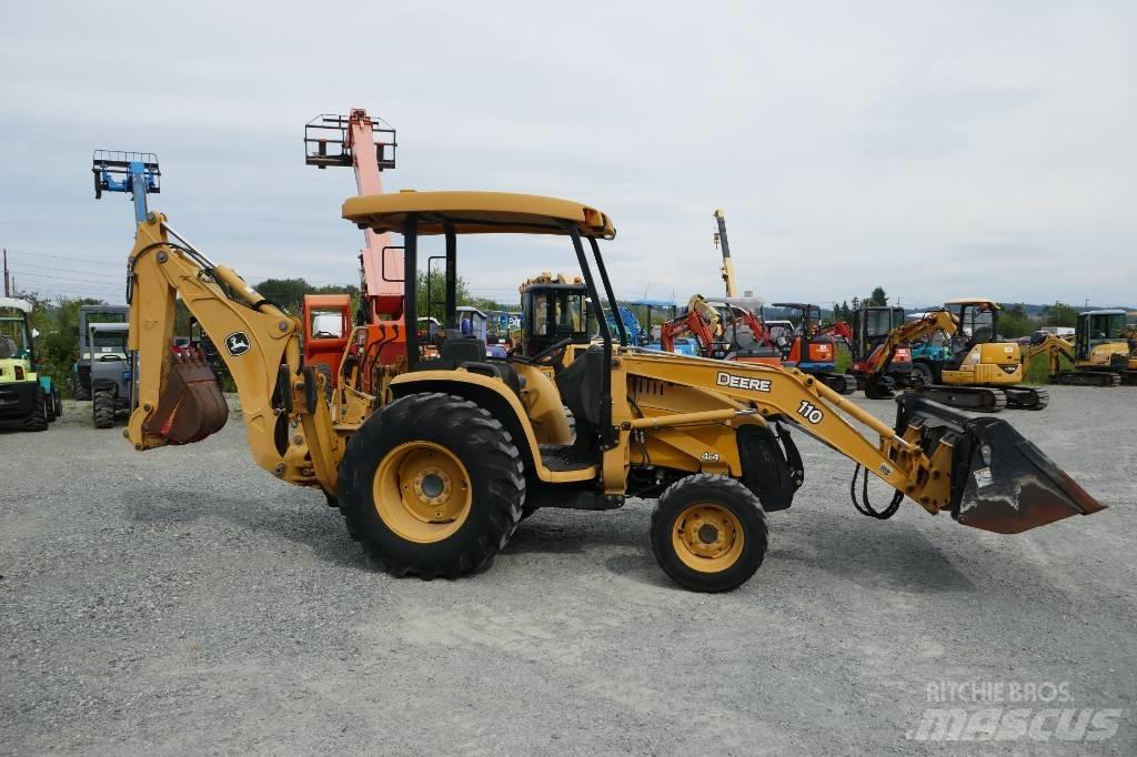 DEERE 110 Retrocargadoras