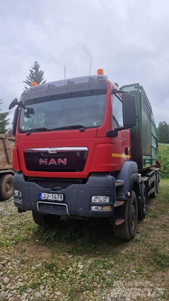 MAN TGS + Neuson 1266 Trituradoras de madera