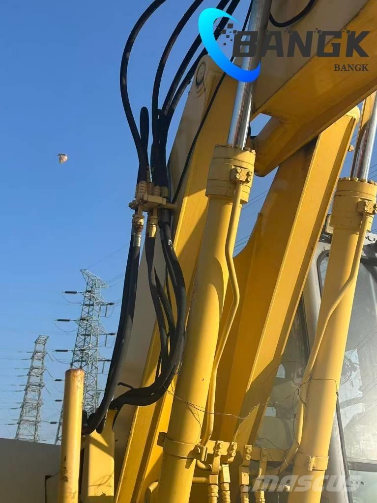  KOMΛ1'SU PW128us Excavadoras de ruedas