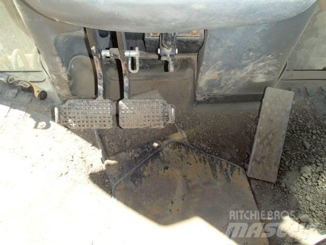 New Holland B 115 B Retrocargadoras