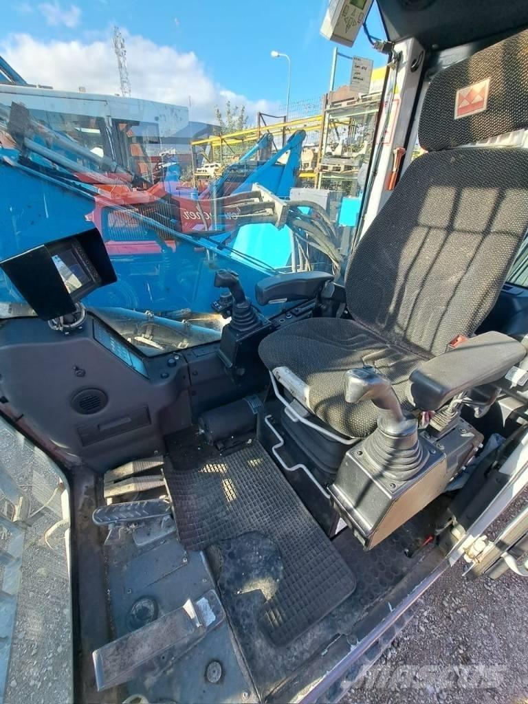 Fuchs MHL 320 Excavadoras de manutención