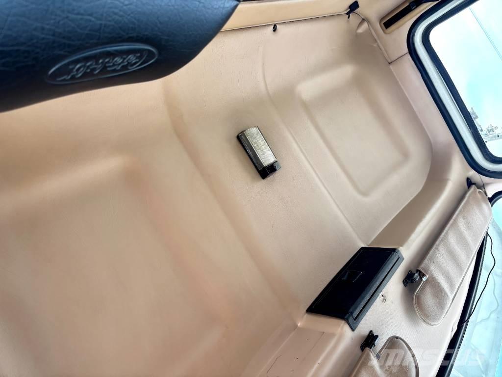 Mack Granite Camiones con gancho