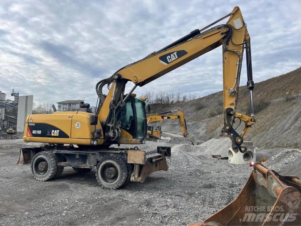 CAT M318D Excavadoras de ruedas