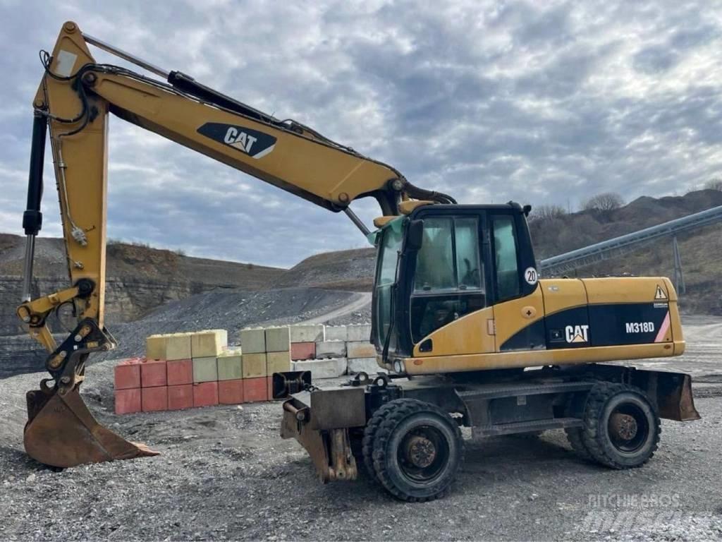 CAT M318D Excavadoras de ruedas