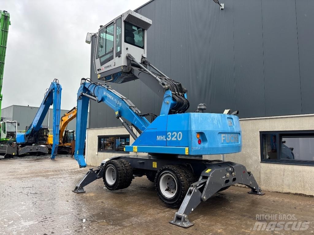 Fuchs MHL 320 D Excavadoras de manutención