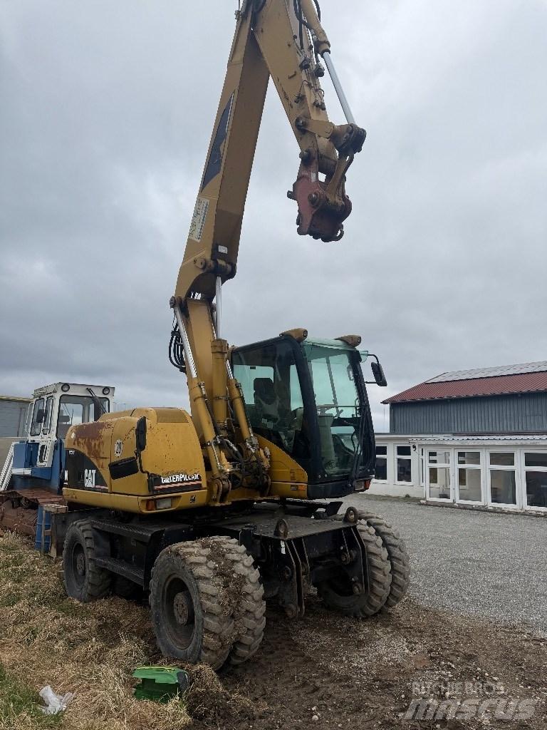 CAT M 313 C Excavadoras de ruedas