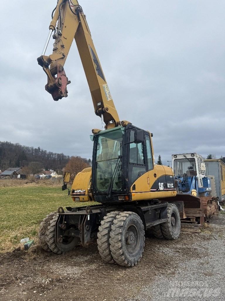 CAT M 313 C Excavadoras de ruedas