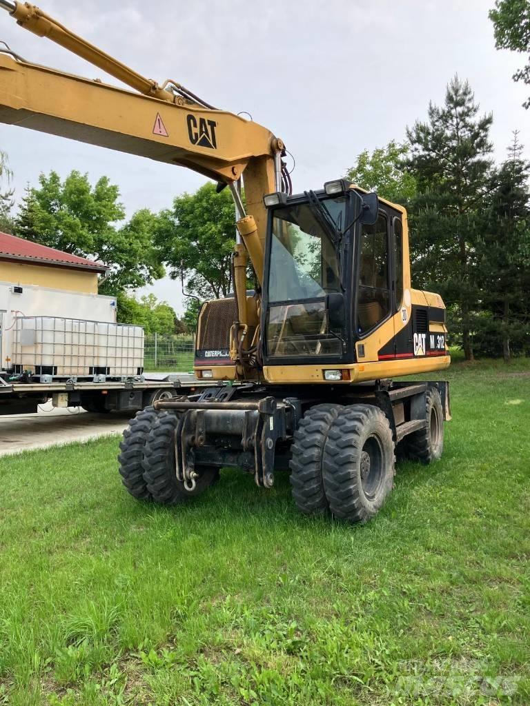 CAT M 312 Excavadoras de ruedas