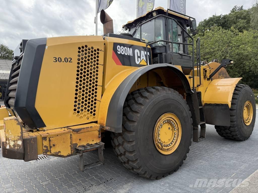 CAT 980M shovel + Bak Cargadoras sobre ruedas