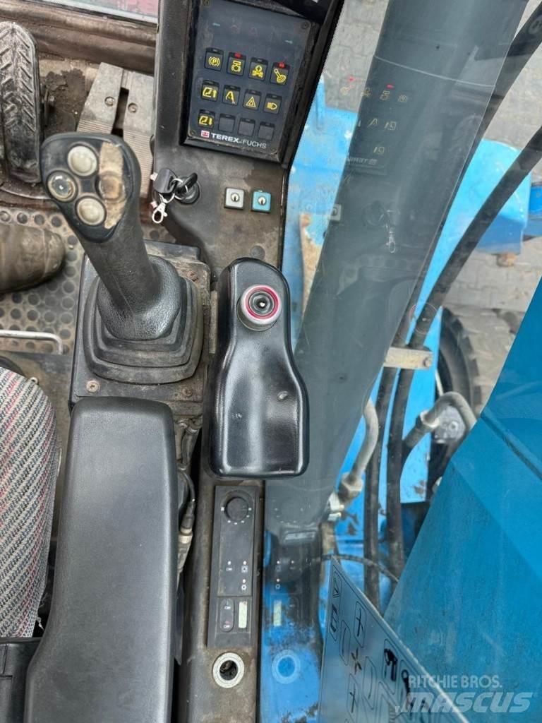 Fuchs MHL 320 Excavadoras de manutención