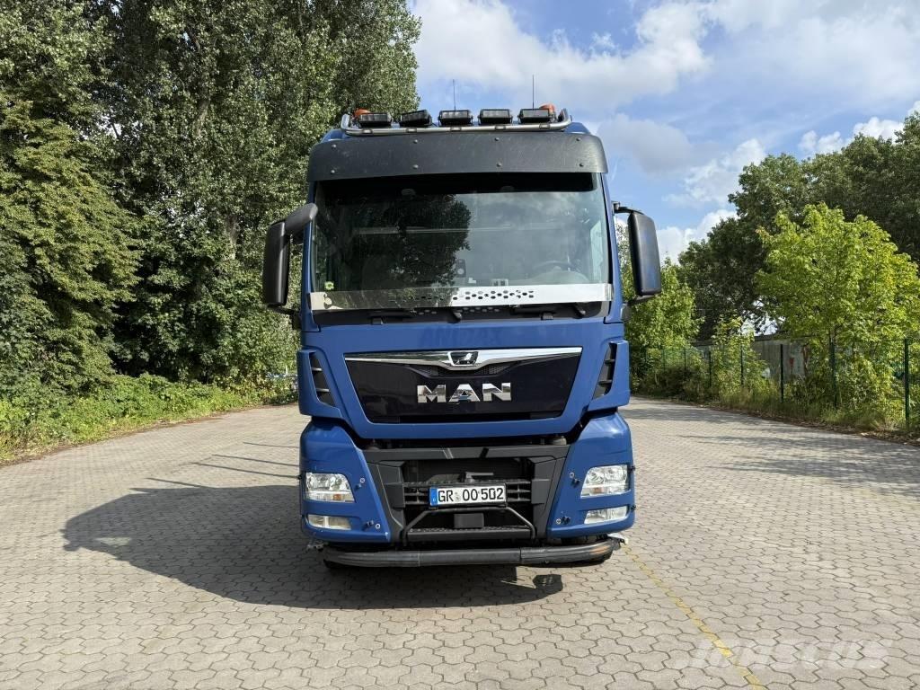 MAN TGX 33.500 Camiones de transporte de maquinaria forestal