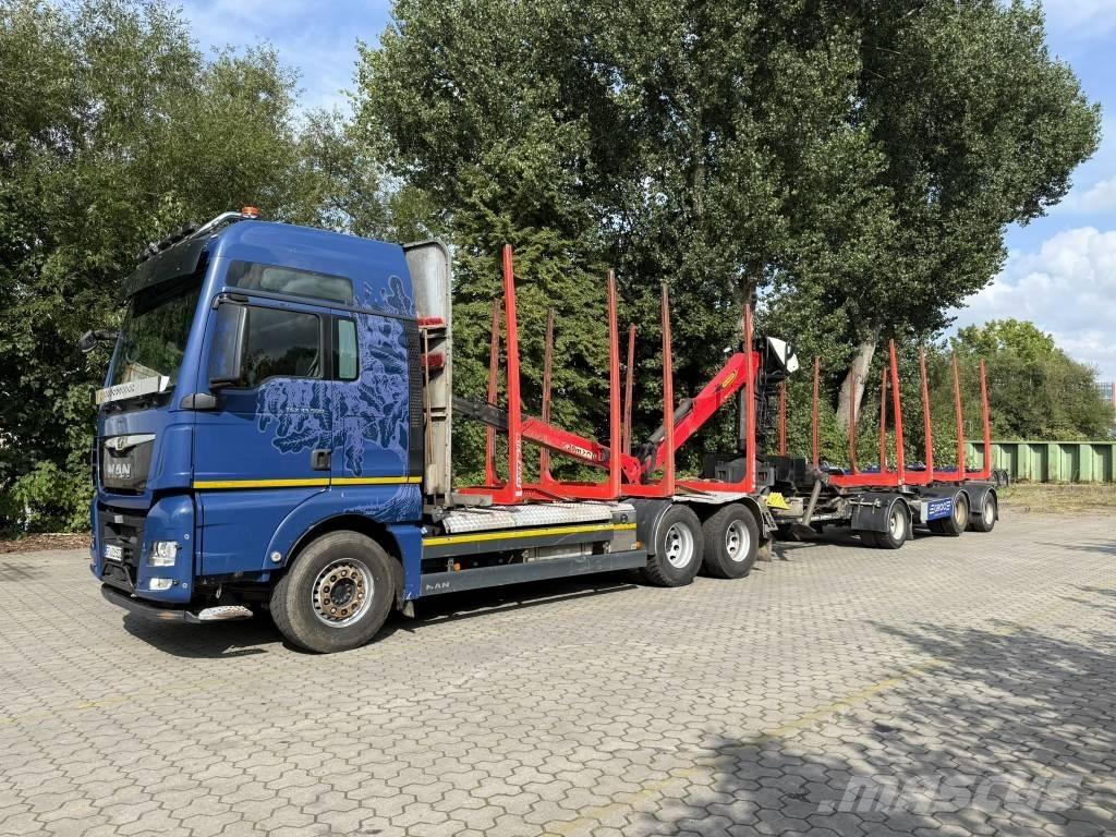 MAN TGX 33.500 Camiones de transporte de maquinaria forestal