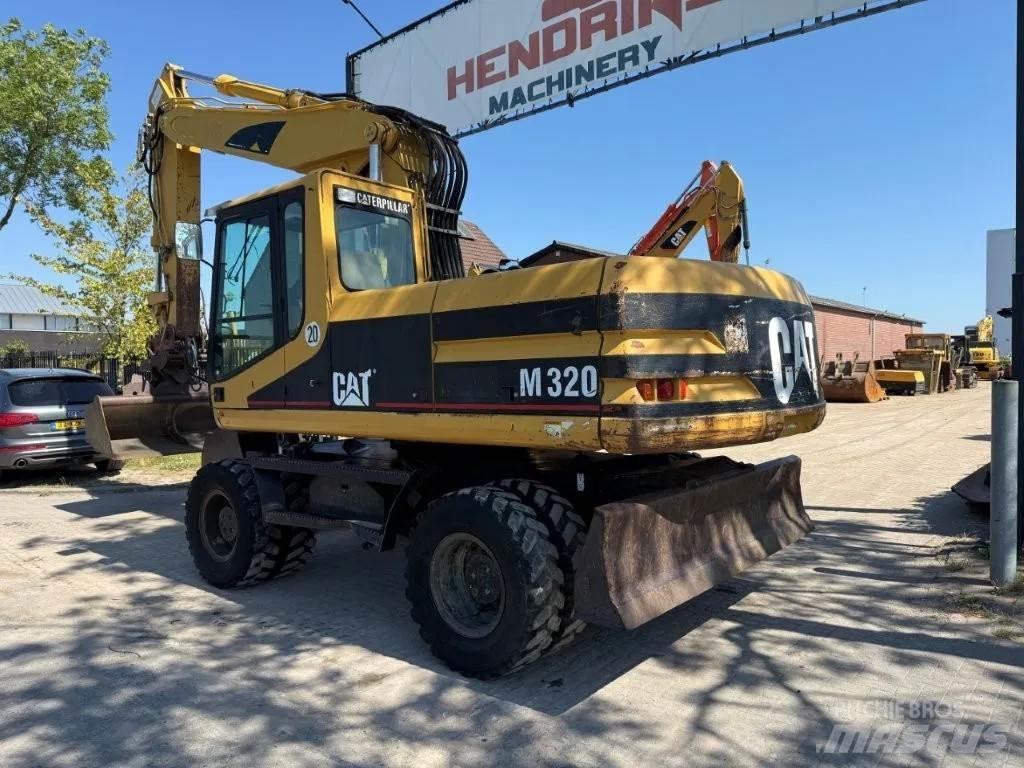 CAT M320 2001 Excavadoras de ruedas