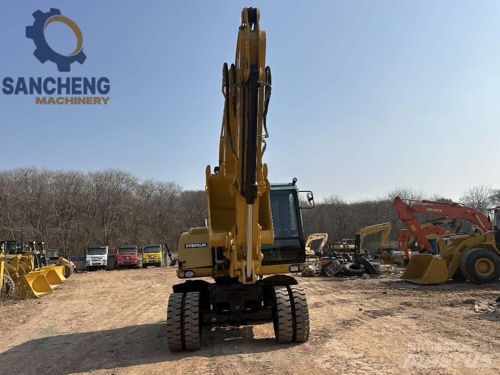 CAT M 320 D2 Excavadoras de ruedas