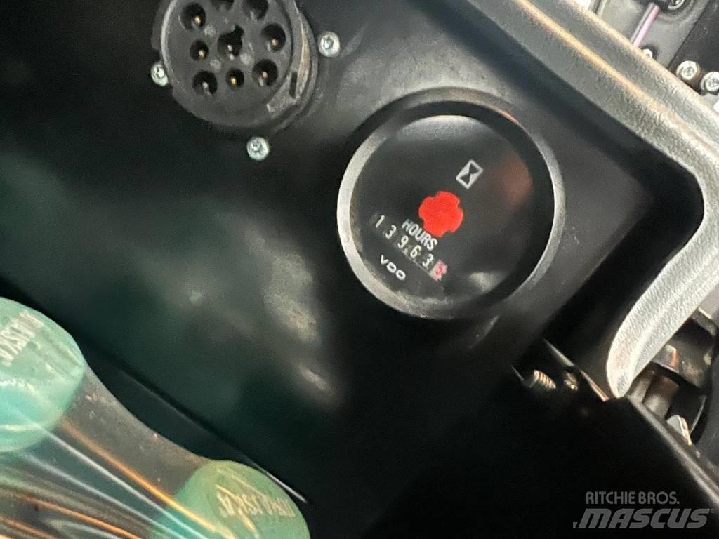 John Deere 1010 E Autocargadoras