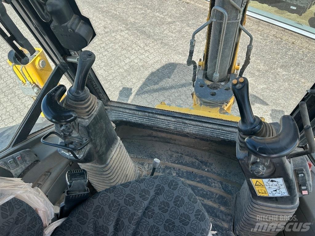 New Holland B 100 C Retrocargadoras