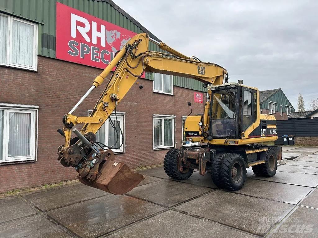 CAT M315 +ROTO CE Excavadoras de ruedas