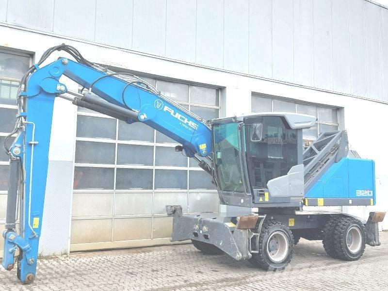 Fuchs MHL 320 F Excavadoras de manutención
