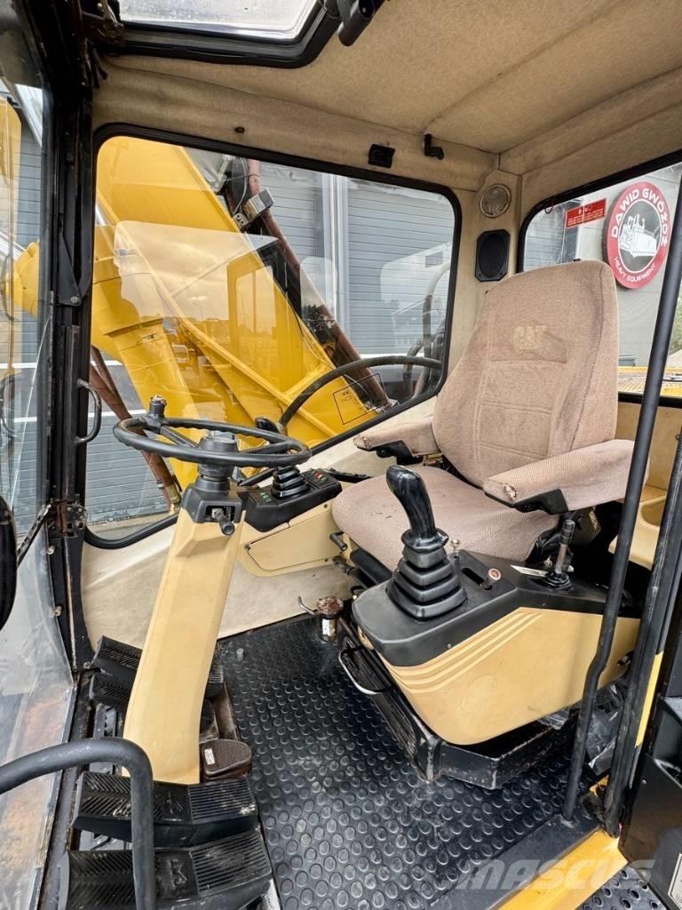 CAT M 318 Excavadoras de ruedas