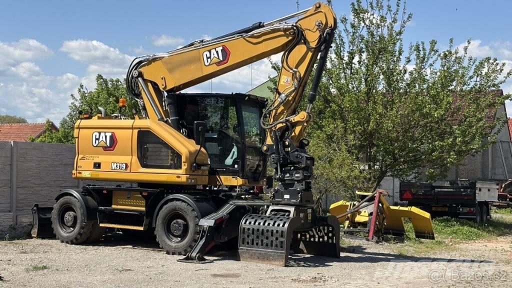CAT M 319 Excavadoras de ruedas