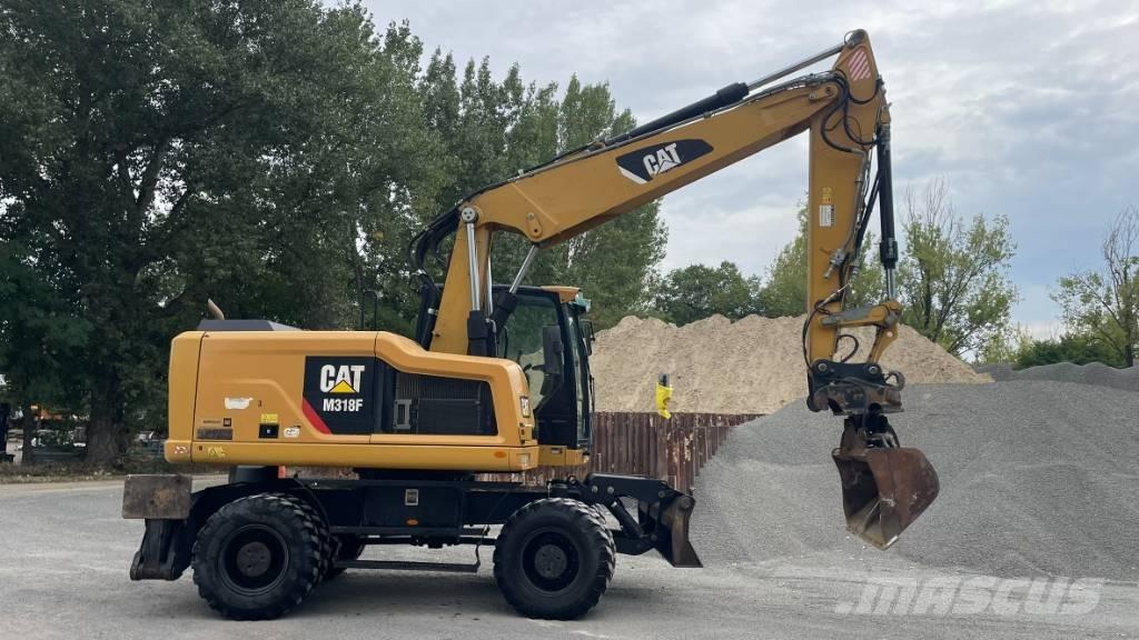CAT M 318 F Retrocargadoras