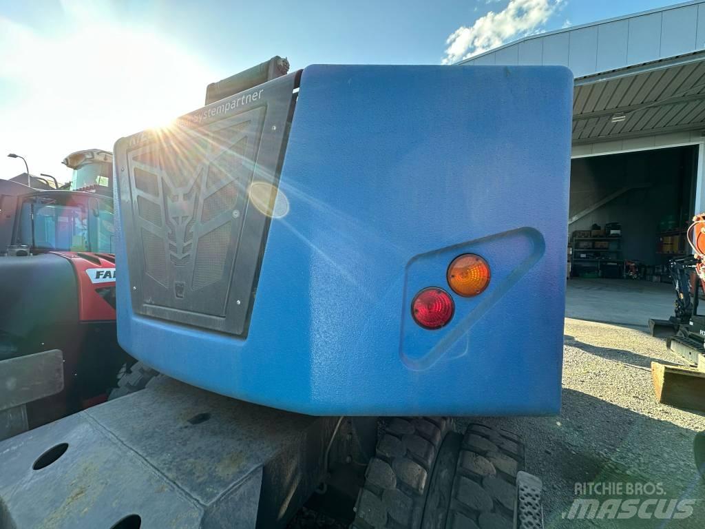 Fuchs MHL 310 S5 Excavadoras de manutención
