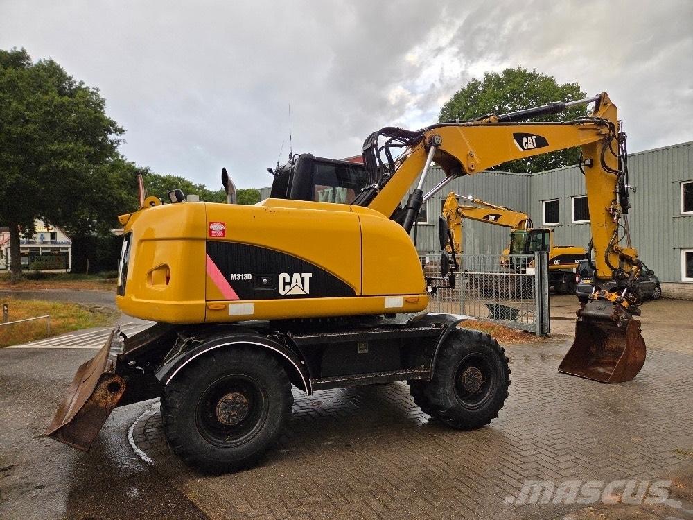 CAT M313D Excavadoras de ruedas