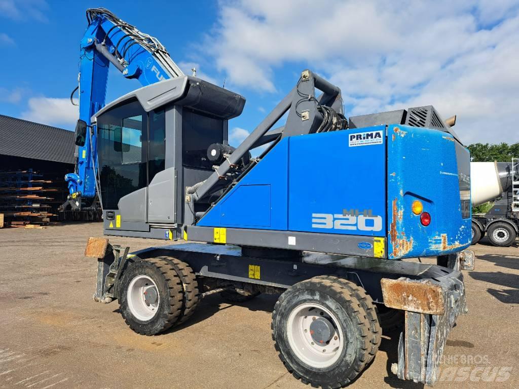 Fuchs MHL320F Excavadoras de manutención