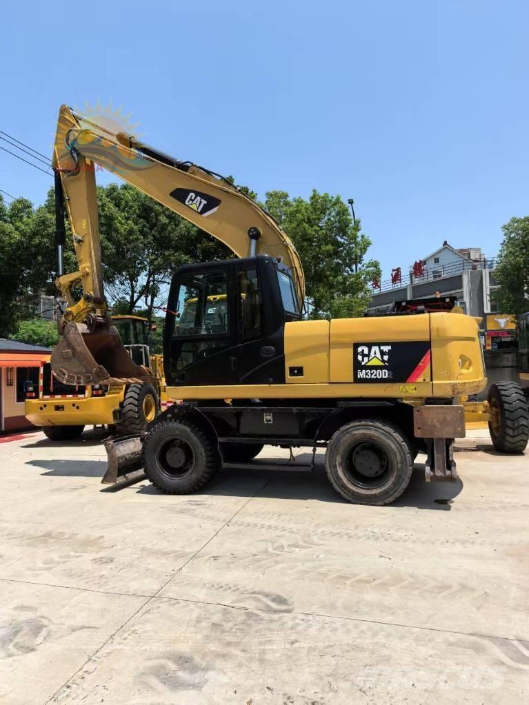 CAT M 320D2 Excavadoras de ruedas