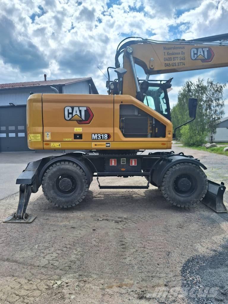 CAT M 318 Excavadoras de ruedas
