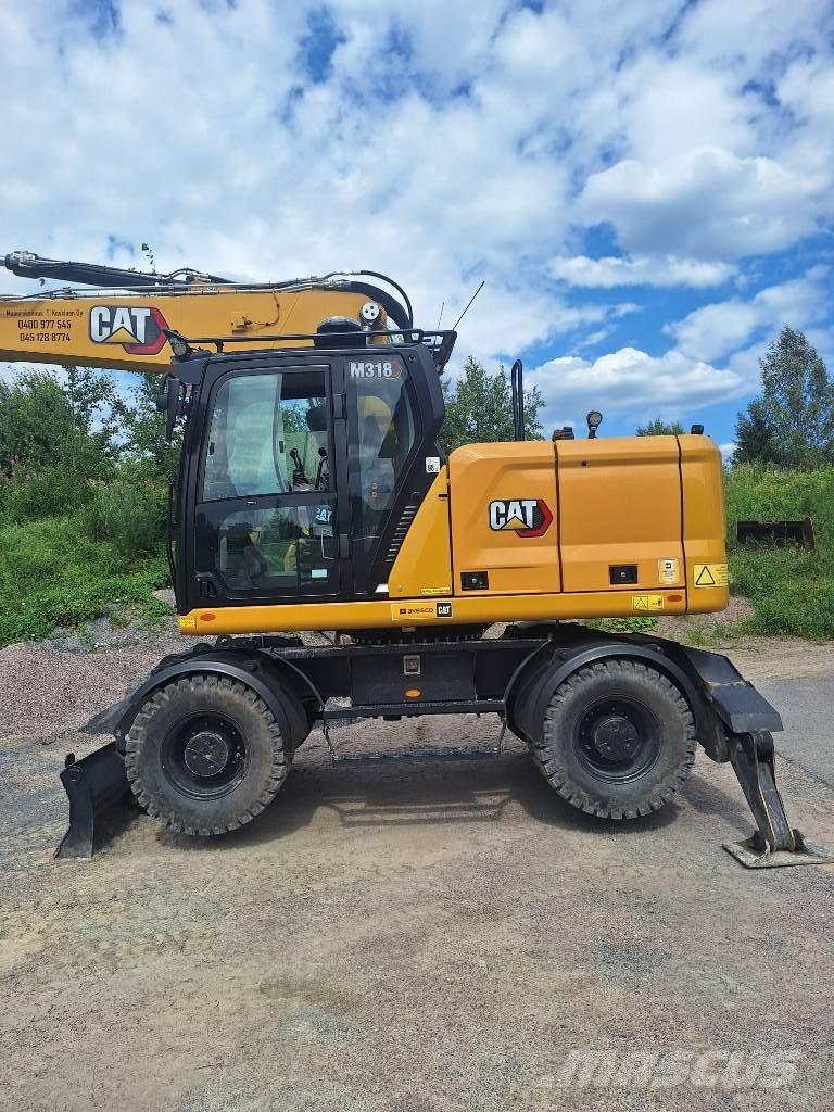 CAT M 318 Excavadoras de ruedas