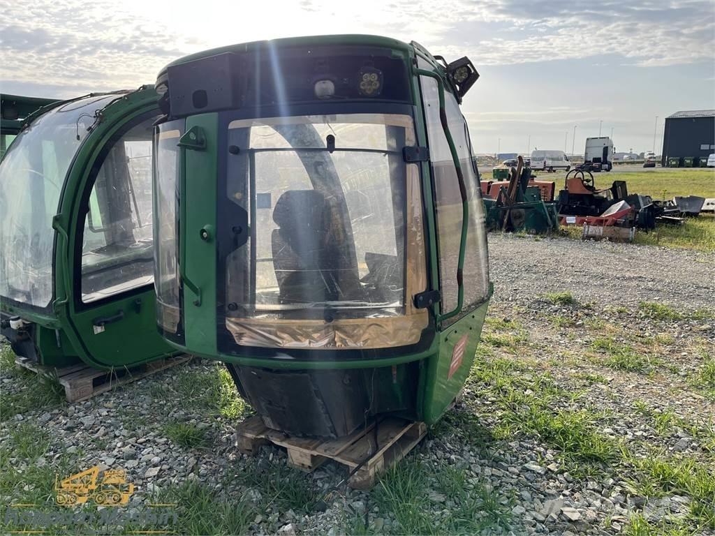 John Deere 1010E Cabinas e interior