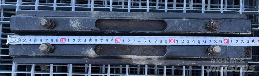  TXD 450A Cadenas, orugas y chasis