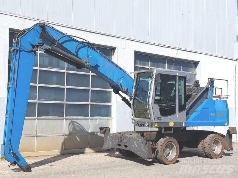 Fuchs MHL 320 D Excavadoras de manutención