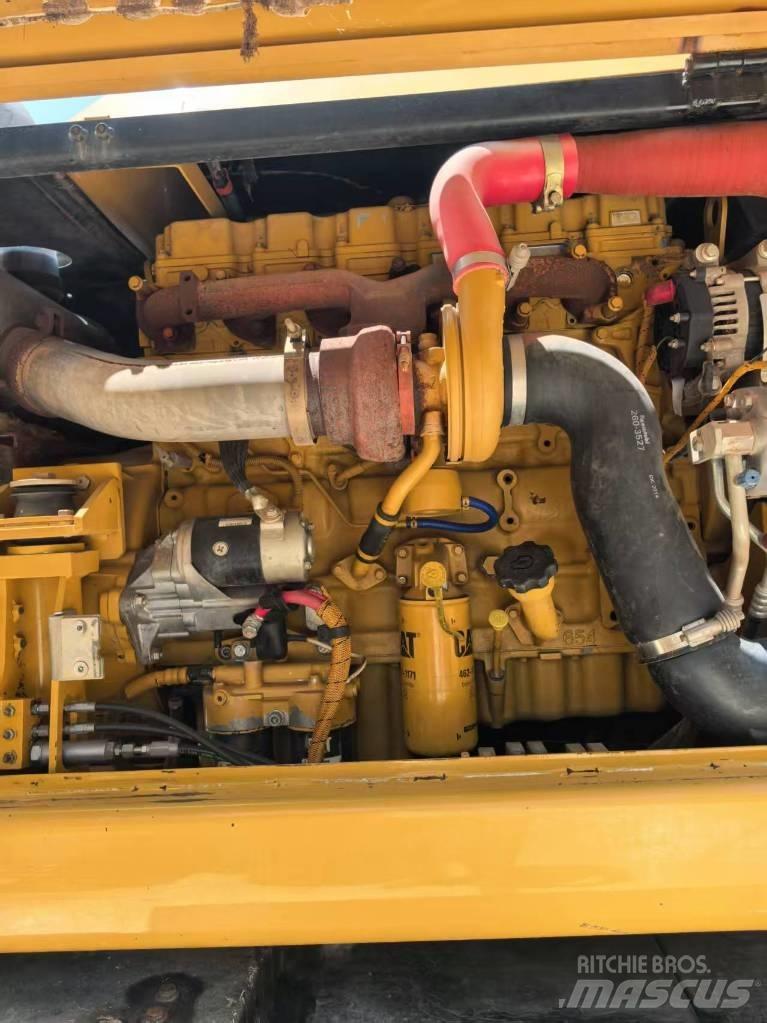 CAT M 320 Excavadoras de ruedas