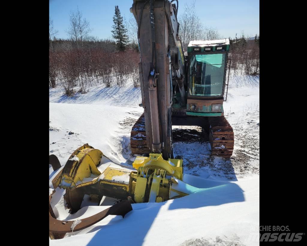 John Deere 853 Talador apilador