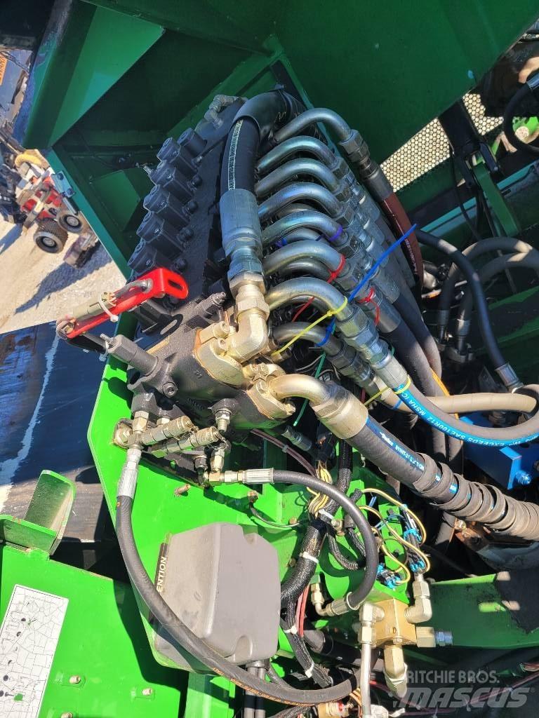 John Deere 853 Talador apilador