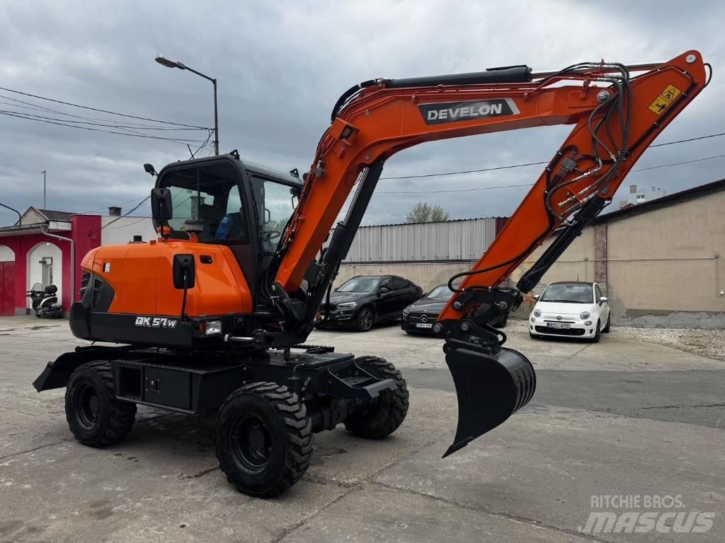 Develon DX 57 W-7 Excavadoras de ruedas