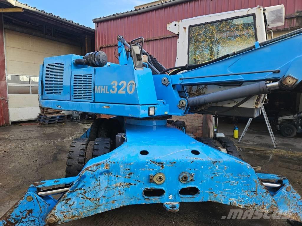 Fuchs MHL 320 D Excavadoras de manutención