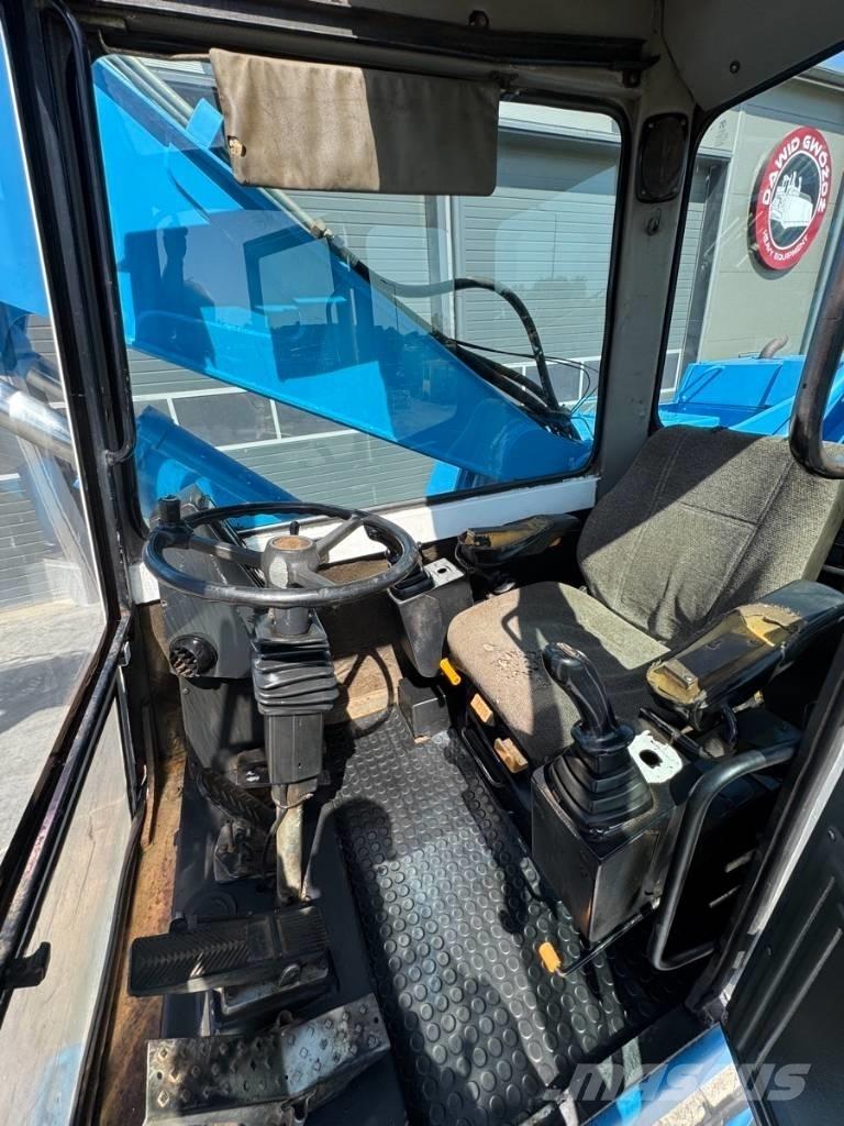 Fuchs MHL 331 Excavadoras de manutención