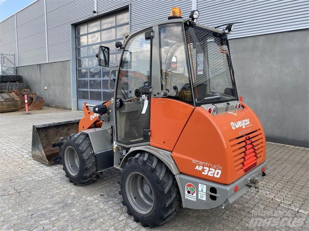 Weycor AR320 Cab Cargadoras multifunción